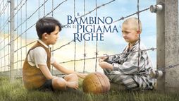 Il bambino con il pigiama a righe